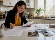 Parent reviewing custody legal documents at home
