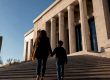 Mother and child approaching family courthouse