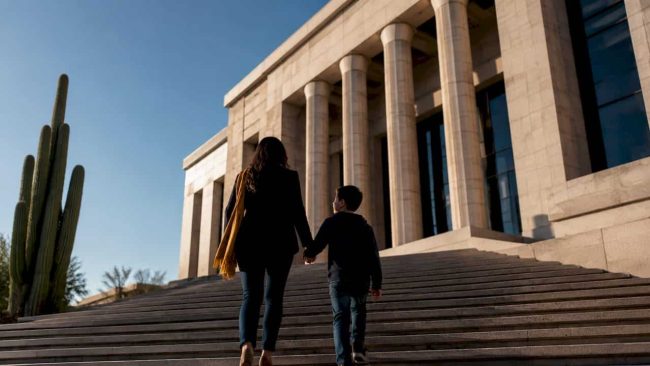 Mother and child approaching family courthouse
