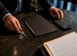 Marital asset division materials on conference table