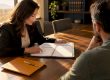 Attorney and parent reviewing custody materials