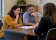 Parents discussing school choice with family attorney