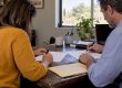 Couple reviewing a signed divorce agreement