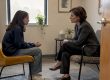 Child speaking privately with family law attorney