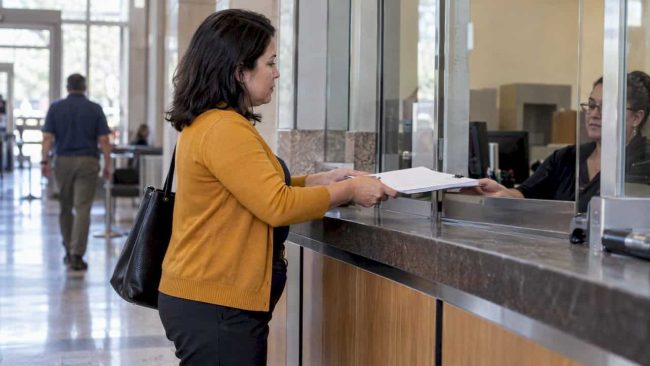 Parent submitting a court filing packet